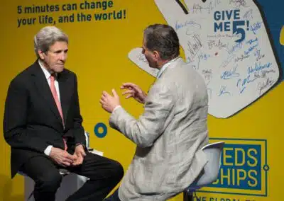 Frank Zammataro shaking hands with Former Secretary of State John Kerry, 2018
